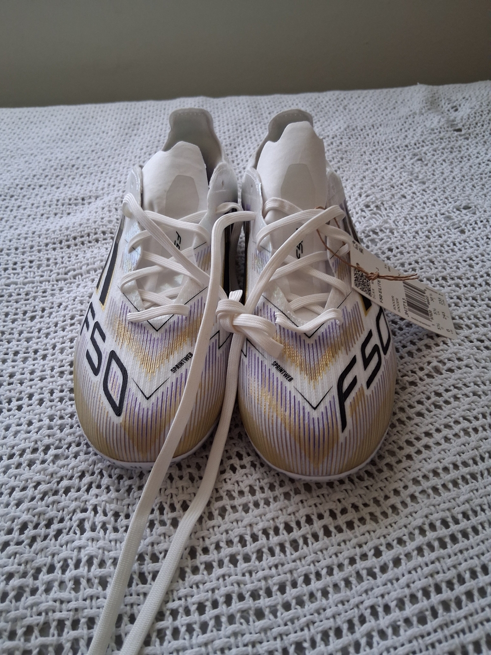 adidas White Soccer Cleats with Gold and Purple Accents